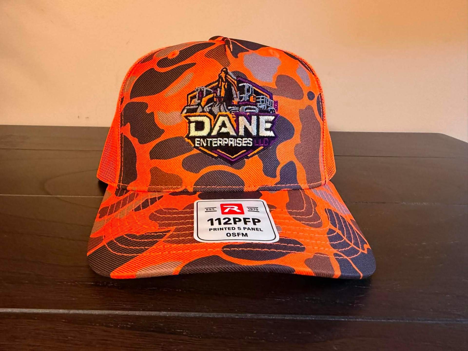 Official Dane Enterprises branded trucker hat